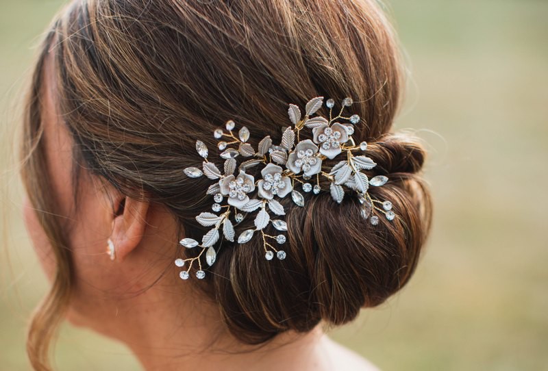 A woman wearing white clips