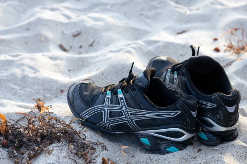 Running shoes in the sand