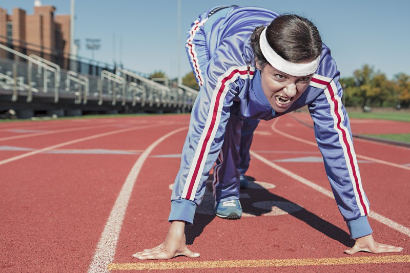 A woman preparing to run