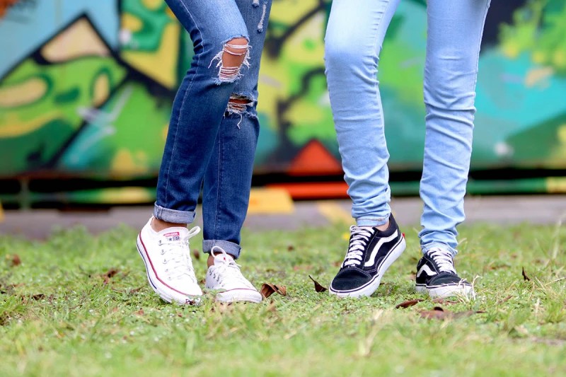 Young people wearing blue jeans