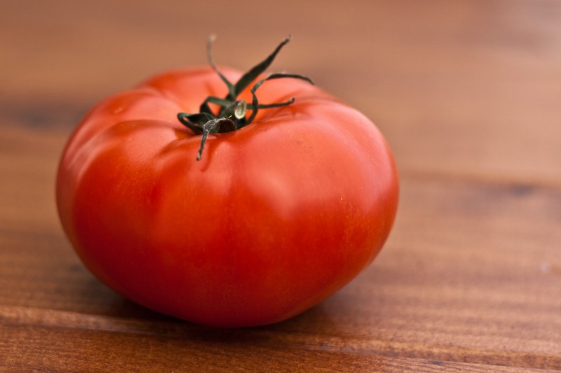 A single red tomato