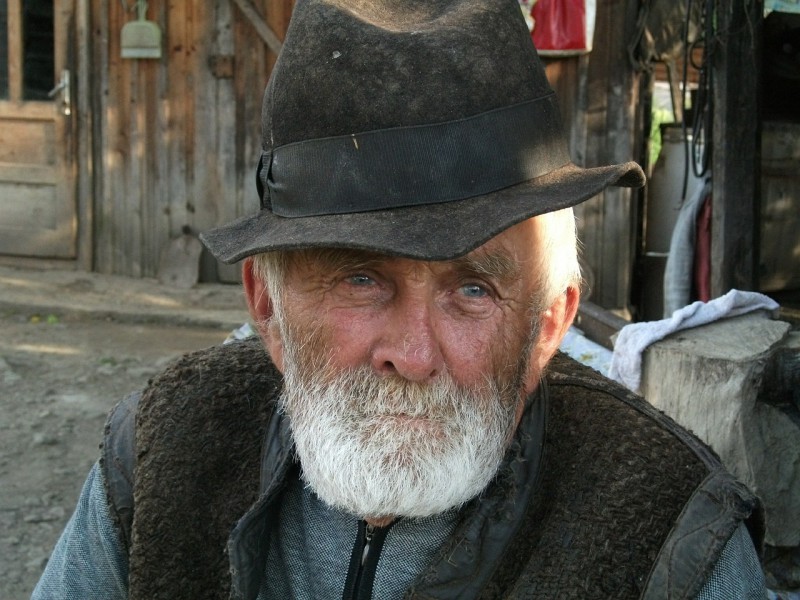 An old man with a hat