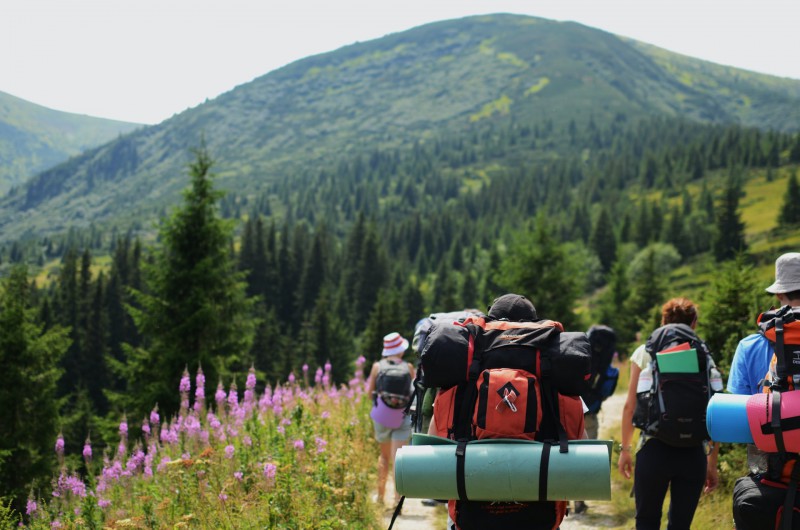 People hiking with backpacks 
